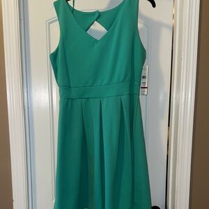 Tiana B. Teal Dress with Modern Design